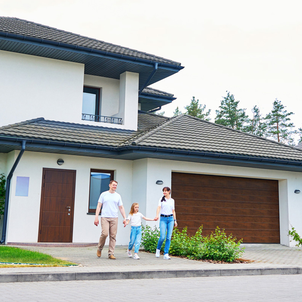 family going from new modern townhouse outdoors